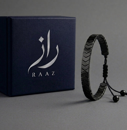 Black bracelet with RAAZ branding on a grey background