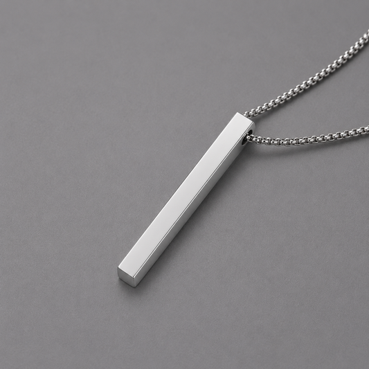 Silver bar necklace on a grey background