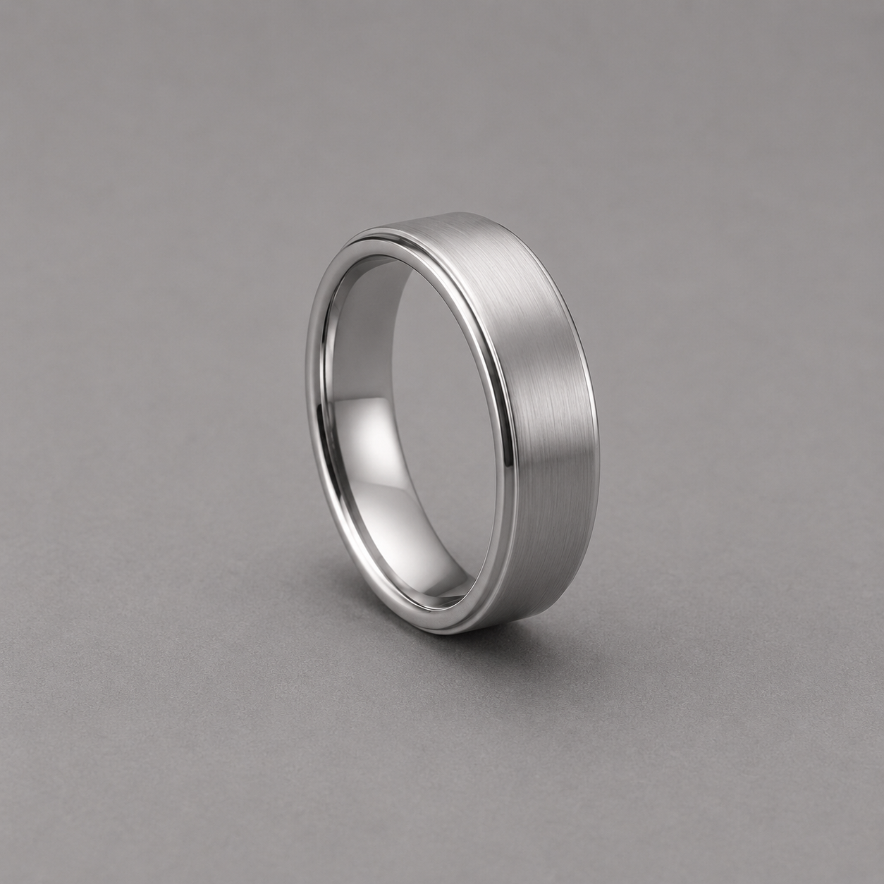 Silver ring on a grey background