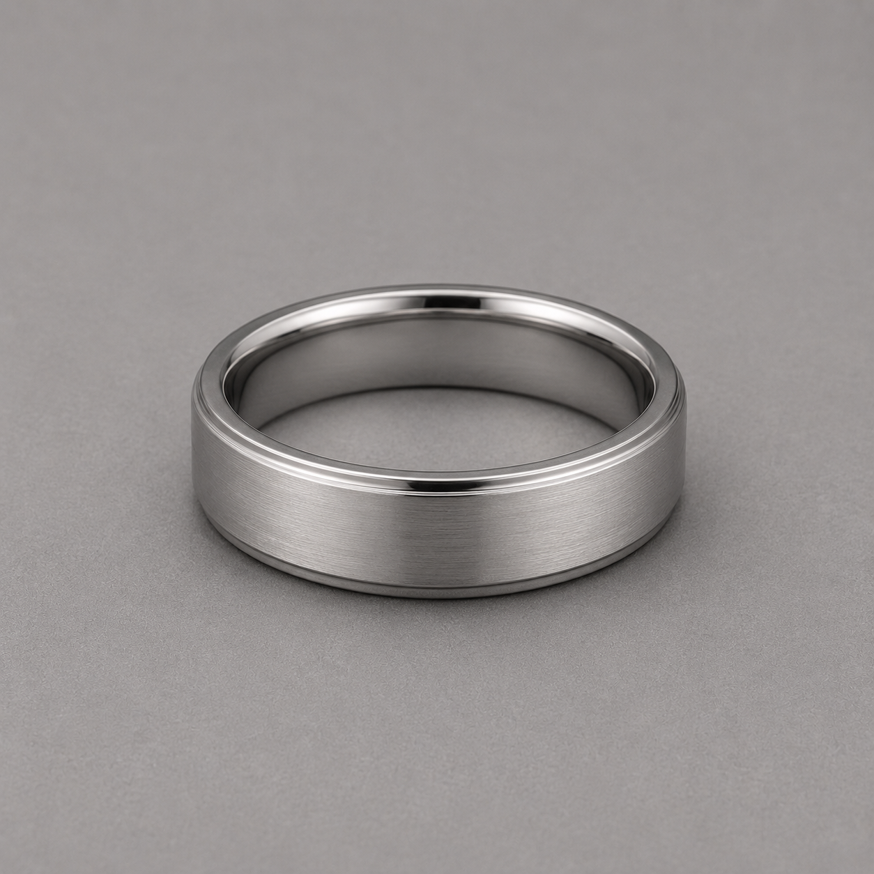 Silver ring on a grey background